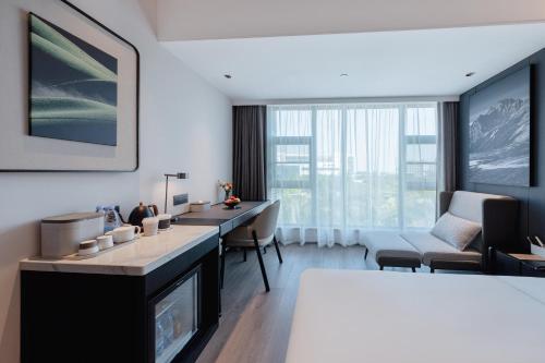 Imagen de la habitación del Hotel Atour X Xiamen Gaoqi Airport Huli Innovation Park Metro Station. Foto 4