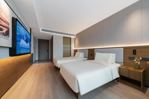Imagen de la habitación del Hotel Atour X Xiamen Railway Station South Plaza. Foto 10