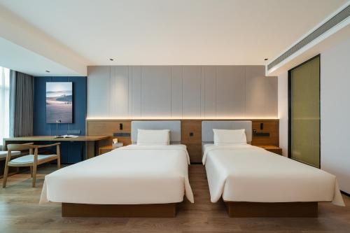 Imagen de la habitación del Hotel Atour X Xiamen Railway Station South Plaza. Foto 16