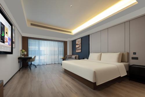 Imagen de la habitación del Hotel Atour X Xishuangbanna Jinghong Splashing Water Plaza. Foto 2