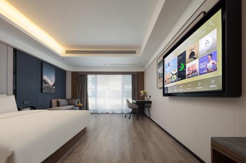 Imagen de la habitación del Hotel Atour X Xishuangbanna Jinghong Splashing Water Plaza. Foto 4