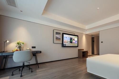 Imagen de la habitación del Hotel Atour X Xishuangbanna Jinghong Splashing Water Plaza. Foto 5