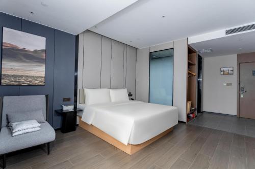 Imagen de la habitación del Hotel Atour X Zhuhai Gongbei Port High Speed Railway Station. Foto 11