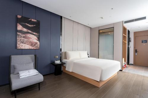 Imagen de la habitación del Hotel Atour X Zhuhai Gongbei Port High Speed Railway Station. Foto 12