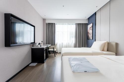 Imagen de la habitación del Hotel Atour X Zhuhai Gongbei Port High Speed Railway Station. Foto 14