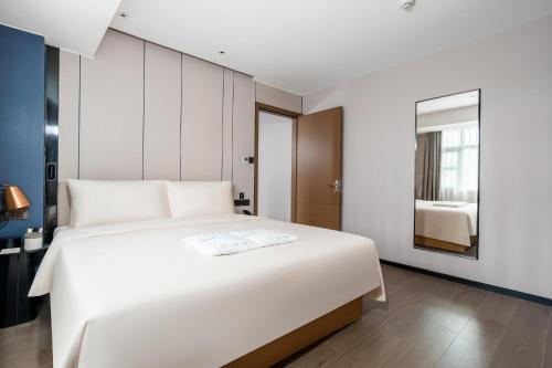 Imagen de la habitación del Hotel Atour X Zhuhai Gongbei Port High Speed Railway Station. Foto 15