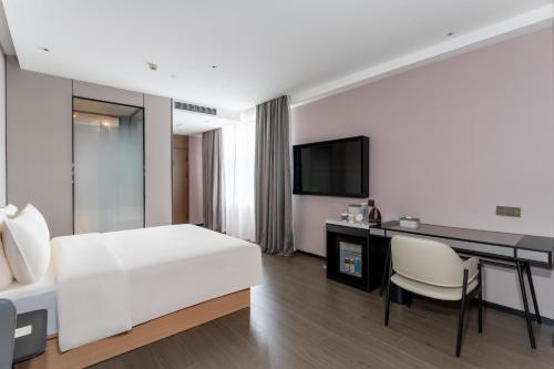 Imagen de la habitación del Hotel Atour X Zhuhai Gongbei Port High Speed Railway Station. Foto 16