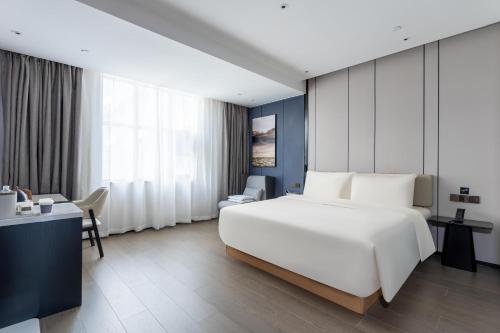 Imagen de la habitación del Hotel Atour X Zhuhai Gongbei Port High Speed Railway Station. Foto 19