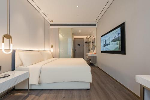 Imagen de la habitación del Hotel Atour X hotel Shanghai Wujiaochang INNO Chuangzhi. Foto 11