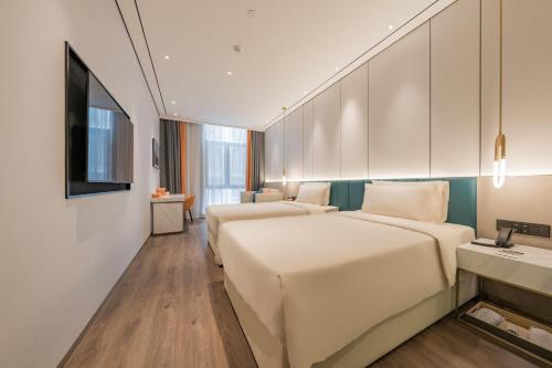 Imagen de la habitación del Hotel Atour X hotel Shanghai Wujiaochang INNO Chuangzhi. Foto 13