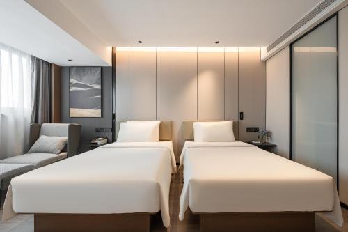 Imagen de la habitación del Hotel Atour Xiamen Gaoqi Airport Chenggong Avenue. Foto 11