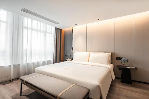 Imagen de la habitación del Hotel Atour Xiamen Gaoqi Airport Chenggong Avenue. Foto 15