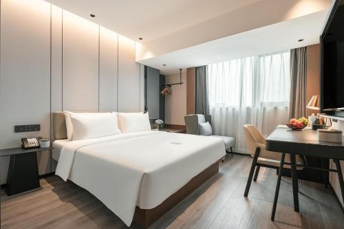 Imagen de la habitación del Hotel Atour Xiamen Gaoqi Airport Chenggong Avenue. Foto 16