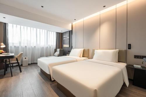 Imagen de la habitación del Hotel Atour Xiamen Gaoqi Airport Chenggong Avenue. Foto 19