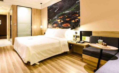 Imagen de la habitación del Hotel Atour Xiamen Haicang Gulangyu Pier Seaview. Foto 15
