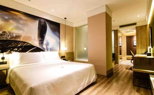 Imagen de la habitación del Hotel Atour Xiamen Haicang Gulangyu Pier Seaview. Foto 16