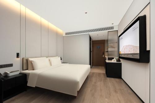 Imagen de la habitación del Hotel Atour Xiamen Huli Nanshan Road. Foto 3
