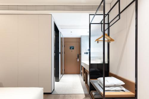 Imagen de la habitación del Hotel Atour Xiamen Huli Nanshan Road. Foto 12
