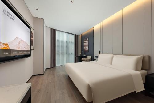 Imagen de la habitación del Hotel Atour Xiamen Huli Nanshan Road. Foto 16