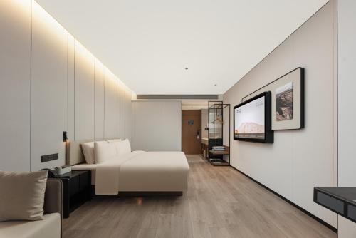 Imagen de la habitación del Hotel Atour Xiamen Huli Nanshan Road. Foto 17