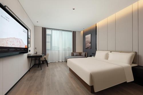 Imagen de la habitación del Hotel Atour Xiamen Huli Nanshan Road. Foto 18