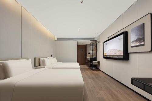Imagen de la habitación del Hotel Atour Xiamen Huli Nanshan Road. Foto 19
