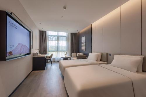 Imagen de la habitación del Hotel Atour Xiamen Huli Powerlong International. Foto 16