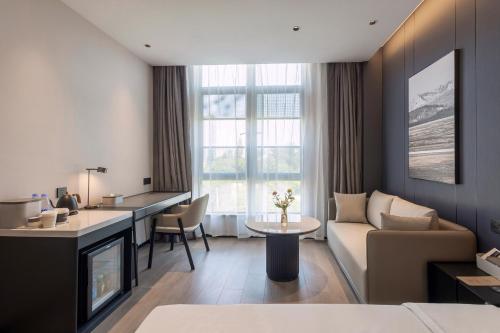 Imagen de la habitación del Hotel Atour Xiamen Huli Powerlong International. Foto 17