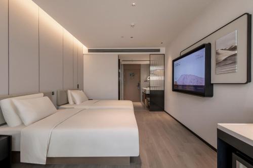 Imagen de la habitación del Hotel Atour Xiamen Huli Powerlong International. Foto 18
