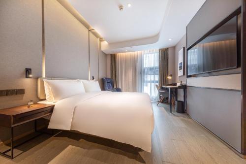 Imagen de la habitación del Hotel Atour Xiamen Jimei Lake Business Center. Foto 9