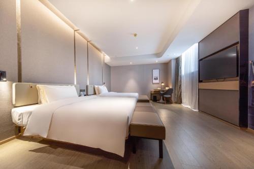 Imagen de la habitación del Hotel Atour Xiamen Jimei Lake Business Center. Foto 12