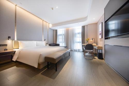 Imagen de la habitación del Hotel Atour Xiamen Jimei Lake Business Center. Foto 13