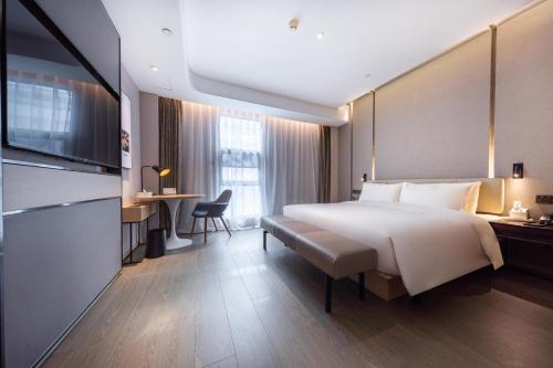 Imagen de la habitación del Hotel Atour Xiamen Jimei Lake Business Center. Foto 15