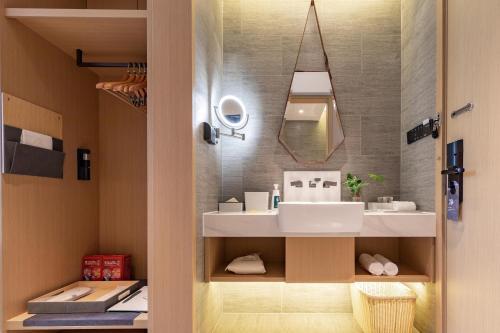Imagen de la habitación del Hotel Atour Xiamen Lianban Mingfa Plaza. Foto 12