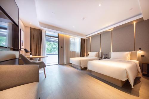 Imagen de la habitación del Hotel Atour Xiamen Lianban Mingfa Plaza. Foto 14