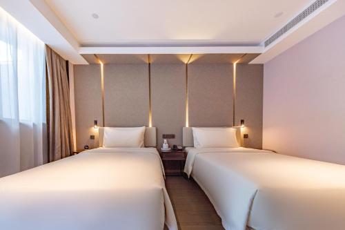 Imagen de la habitación del Hotel Atour Xiamen Lianban Mingfa Plaza. Foto 15