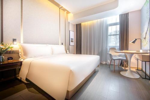 Imagen de la habitación del Hotel Atour Xiamen Lianban Mingfa Plaza. Foto 16