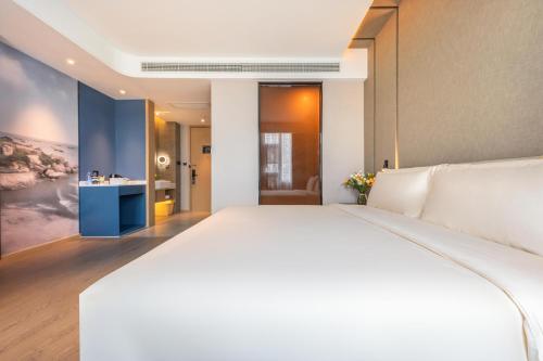 Imagen de la habitación del Hotel Atour Xiamen Lianban Mingfa Plaza. Foto 17