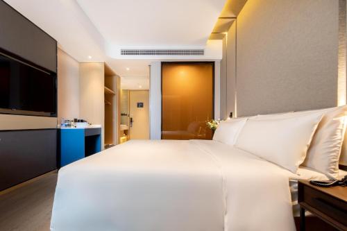 Imagen de la habitación del Hotel Atour Xiamen Lianban Mingfa Plaza. Foto 18