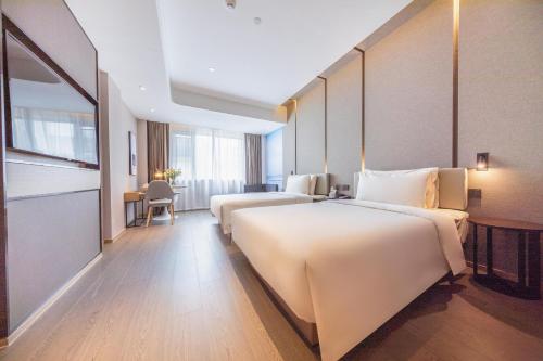 Imagen de la habitación del Hotel Atour Xiamen Lianban Mingfa Plaza. Foto 20