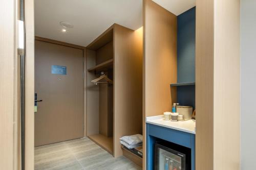 Imagen de la habitación del Hotel Atour Xiamen Meifeng Binhai Romantic Line. Foto 16