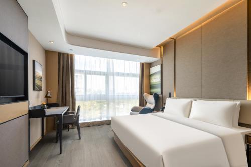 Imagen de la habitación del Hotel Atour Xiamen Meifeng Binhai Romantic Line. Foto 20