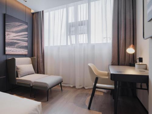 Imagen de la habitación del Hotel Atour Xiamen North Station Jiageng Stadium. Foto 19