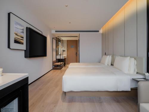 Imagen de la habitación del Hotel Atour Xiamen North Station Jiageng Stadium. Foto 20