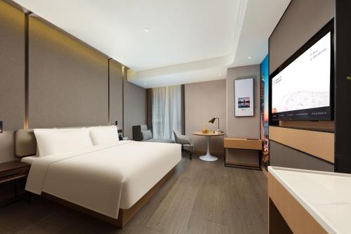 Imagen de la habitación del Hotel Atour Xiamen Wuyuanwan Wanda Plaza. Foto 8