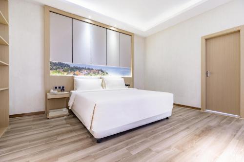Imagen de la habitación del Hotel Atour Xiamen Xiagu Cruise Center. Foto 9