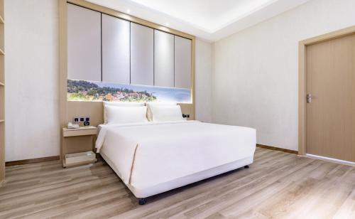 Imagen de la habitación del Hotel Atour Xiamen Xiagu Cruise Center. Foto 11