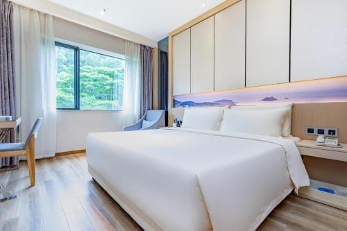 Imagen de la habitación del Hotel Atour Xiamen Xiagu Cruise Center. Foto 12