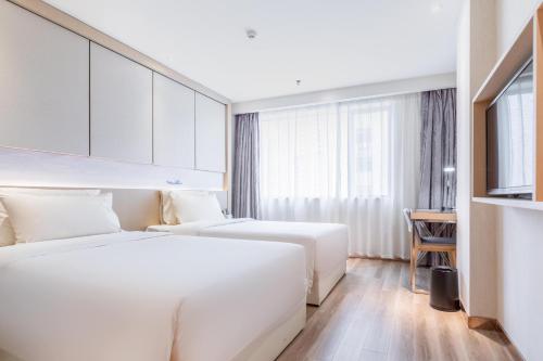 Imagen de la habitación del Hotel Atour Xiamen Xiagu Cruise Center. Foto 13