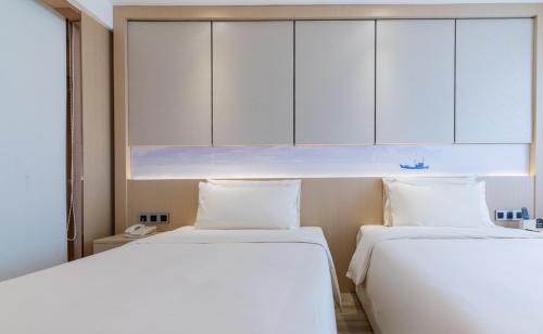 Imagen de la habitación del Hotel Atour Xiamen Xiagu Cruise Center. Foto 16